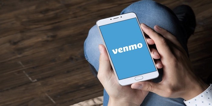 A Person Open Venmo Mobile App For To Unfreeze Venmo Account Concept