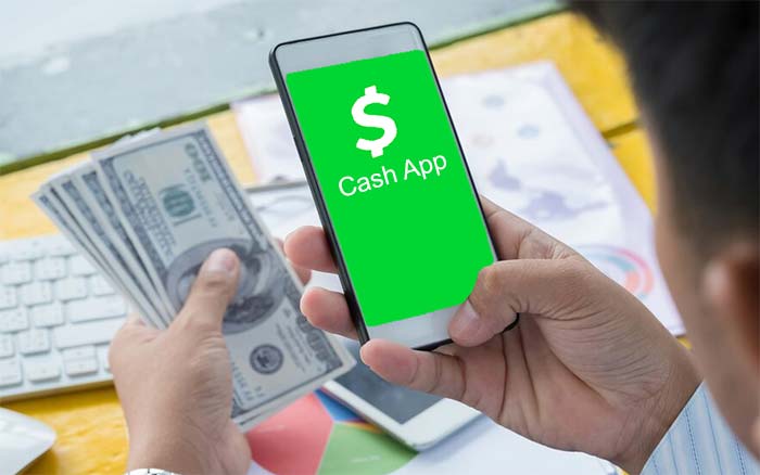 A Cash App is opened on the smartphone to add money Concept